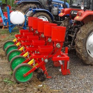 Tractor installs 4 rows of corn planters